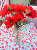 Mazzo di papaveri rosso in vaso