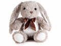 Coniglietto in morbido peluche con fiocco ed orecchie lunghe