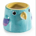 Vaso in ceramica colorata lucida con volto di pappagallo
