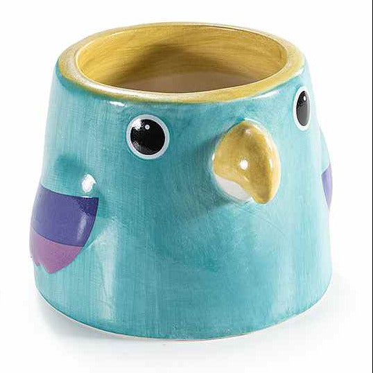 Vaso in ceramica colorata lucida con volto di pappagallo